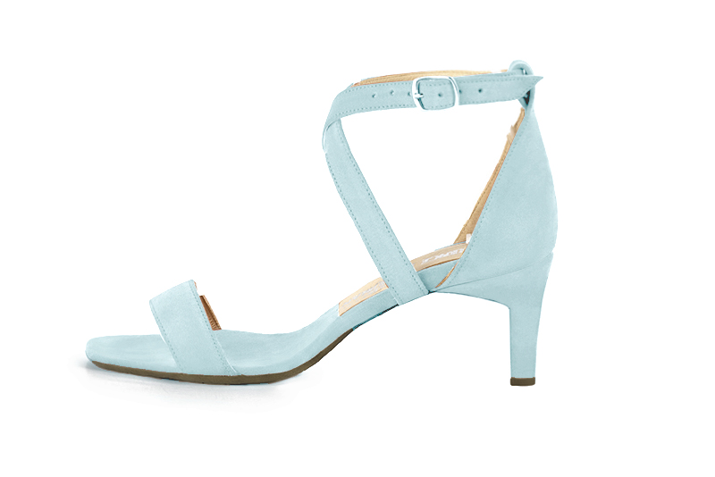Women's  elegant sandals closed at the back with crossed straps. .  - Profile view
